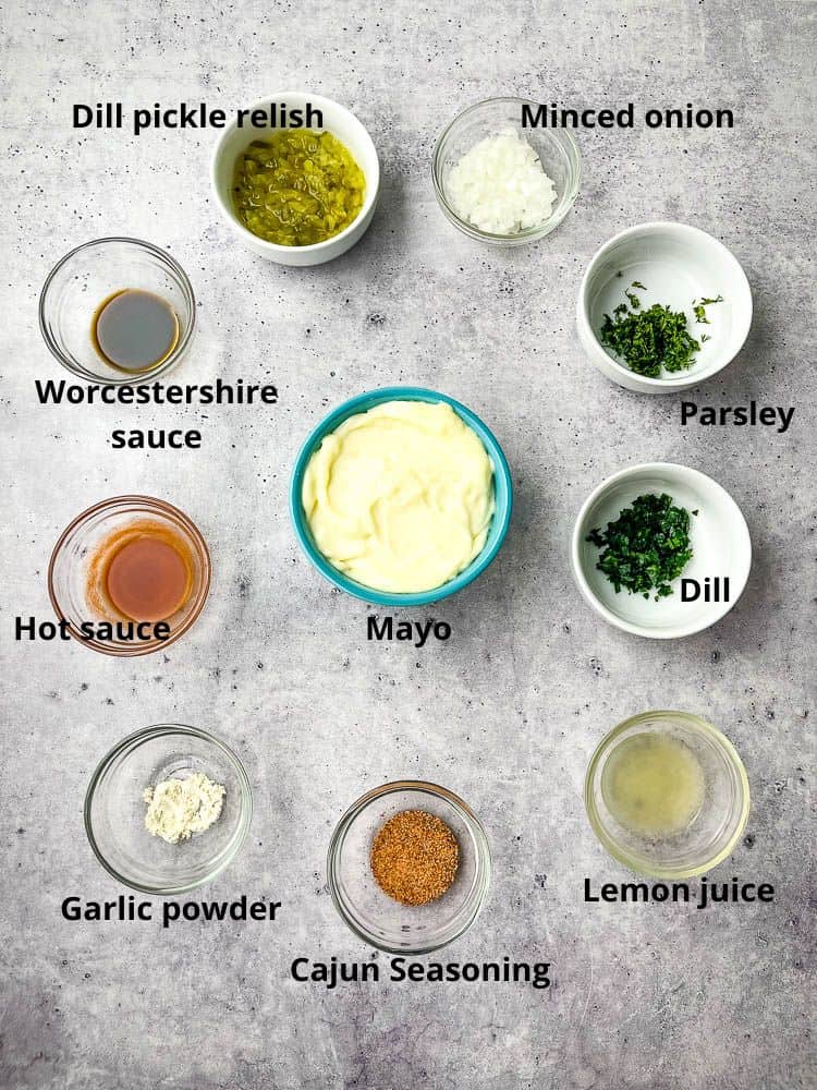 Each tartar sauce ingredient in separate small bowls labeled with the name of the ingredient next to the bowl.