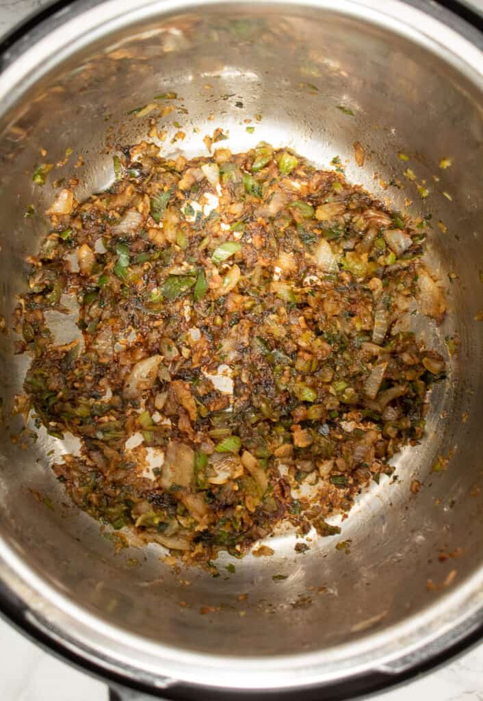 Overhead of chopped veggies cooked and covered in browning sauce.